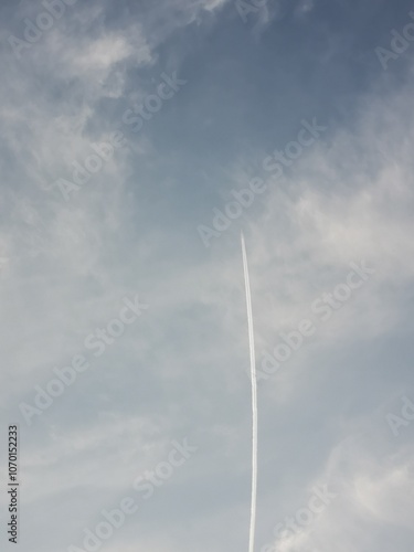 Twilight Sky with a Plane's Contrail