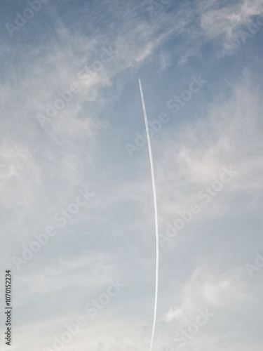 Twilight Sky with a Plane's Contrail