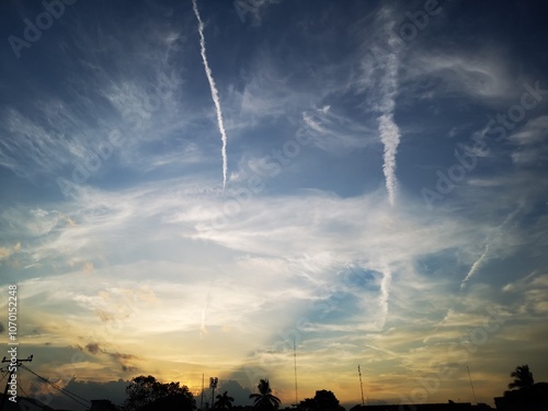 Twilight Sky with a Plane's Contrail
