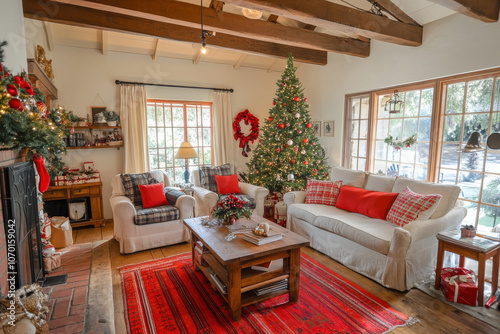 cozy living room with decorated Christmas tree, fireplace and red accents