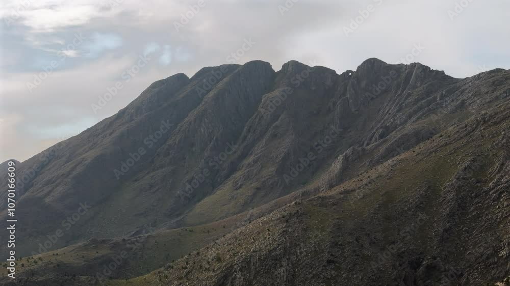 Drone panning shot of the Sierra de la Ventana mountain range in Buenos Aires province, Argentina, featuring its unique rock formations