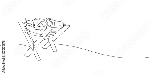 A single line drawing of the Jesus Christ baby in a manger. Continuous line christmas feeder for animals icon. One line icon. Vector illustration.