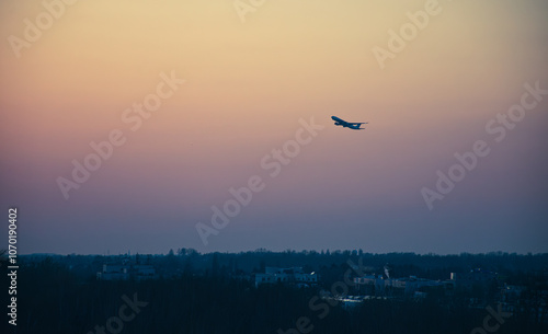 A plane taking of at sunset