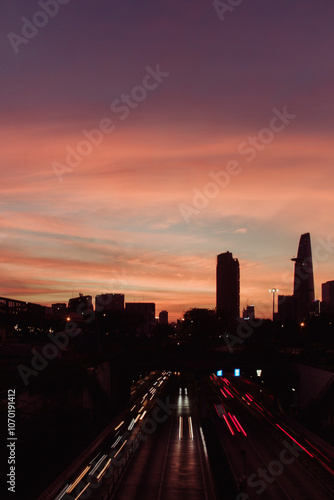Beautiful Sunset with Pink and Blue Sky over Church and City Landscape – Peaceful and Cozy Atmosphere
