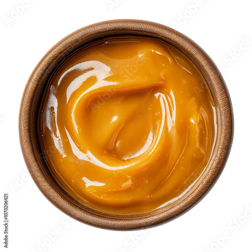 Top View of Smooth Melted Caramel in a Rustic Wooden Bowl on Transparent Background