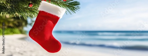 A vibrant Christmas stocking hangs on a palm tree branch above a sun-drenched tropical beach, inviting festive cheer and adventure photo