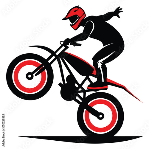 silhouette of a biker doing freestyle tricks