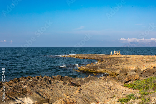 Group of sculptures, statues of people on beach in Can Picafort. Can Picafort, Balearic Islands Mallorca Spain. photo