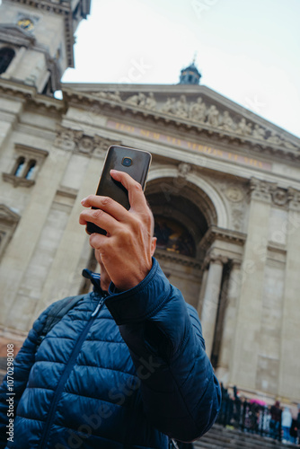 taking a selfie in front of St Stephens, Budapest