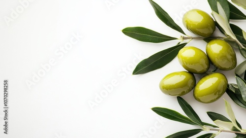 Wallpaper Mural Fresh green olives and olive leaves arranged on a bright background showcasing natural ingredients for healthy cooking and Mediterranean cuisine exploration Torontodigital.ca