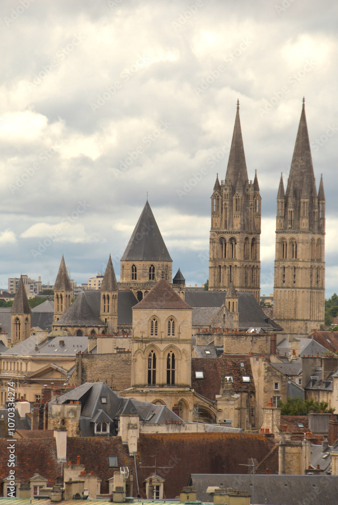 Obraz premium Caen is a beautiful French city in Calvados in Normandy. It has important squares and monuments such as St. Stephen's Abbey and St. Peter's Church.