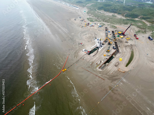 Cuadro en lienzo Connecting a seacable from an offshore windpark to an onshore power hub in Wijk