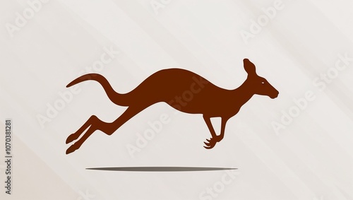  Silhouette of jumping kangaroo on beige background photo