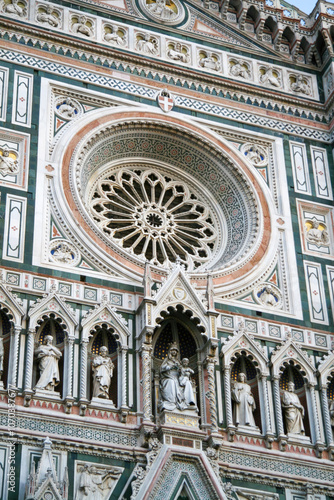 Santa maria del fiore cathedral facade showing rose window and statues