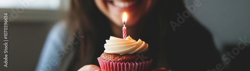 Woman Smiles at Birthday Cu...