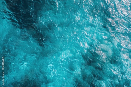 Aerial view of clear turquoise water.