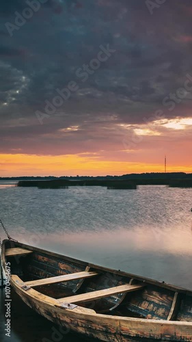 Braslaw Or Braslau, Vitebsk Voblast, Belarus. Wooden Rowing Fishing Boats In Beautiful Summer Sunset On The Dryvyaty Lake. This Is The Largest Lake Of Braslav Lakes. Typical Nature Of Belarus. photo