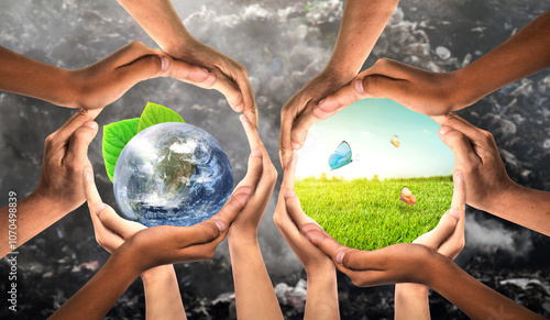 Environmental unity and global earth day and international environment concept with world community as hands protecting nature from pollution and climate change. Symbol and shape created from hands.