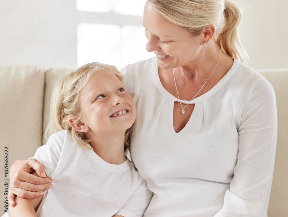 Mother, daughter and hug in home for protection, love and support child in relationship on couch. Mama, girl and embrace kid for trust on weekend, family house and connection for care in living room Mother, daughter and hug in home for protection, love and support child in relationship on couch. Mama, girl and embrace kid for trust on weekend, family house and connection for care in living room