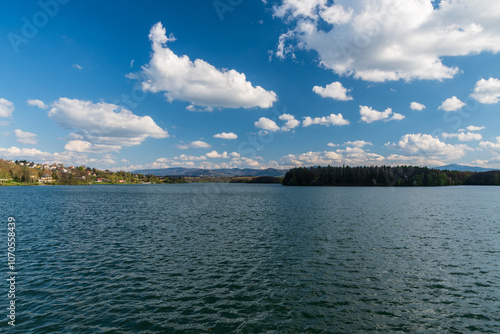 Zermanicka prehrada lake with Sobesovice village above and hills of Moravskoslezske Beskydy mountains on the background in Czech republic photo