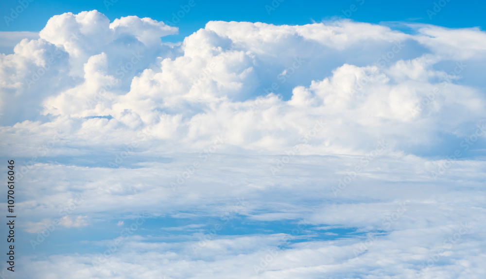 Clouds at the sky. Cloudscape - Blue sky and white clouds. Beautiful blue sky background with clouds. White fluffy clouds in the blue sky. Blue sky and white clouds of daytime Clouds at the sky. Cloudscape - Blue sky and white clouds. Beautiful blue sky background with clouds. White fluffy clouds in the blue sky. Blue sky and white clouds of daytime