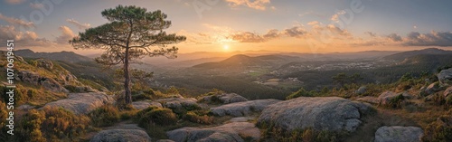 Stunning sunset over the rolling hills and rocky landscape of a serene valley in the countryside