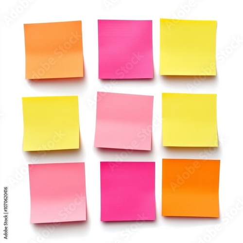 Colorful sticky notes in grid formation on white background