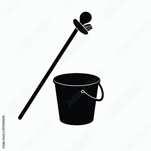 a black and white icon of a broom and a bucket