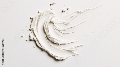 White Paint Swirl on White Background: Abstract Minimalist Texture photo