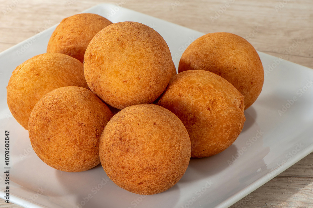 Buñuelos traditional Colombian food, Buñuelo made of wheat flour, consumed at Christmas. Buñuelos traditional Colombian food, Buñuelo made of wheat flour, consumed at Christmas.