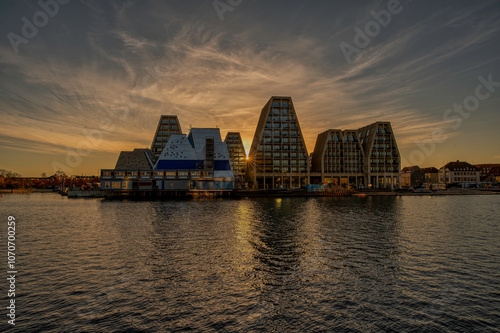 Obraz na płótnie Papiroen in Copenhagen and modern houses in the sunrise w salonie