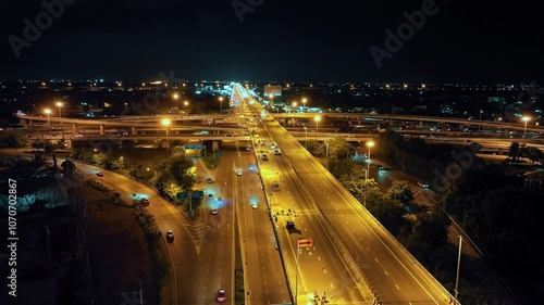 Wallpaper Mural Time lapse,Hyperlapse, Of traffic on city streets at night. Aerial view and top view of traffic on freeway, Expressway top view, Road traffic an important infrastructure Torontodigital.ca