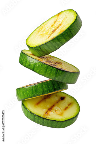 Grilled zucchini slices floating in mid-air, isolated on white background, perfect for healthy food concepts, PNG