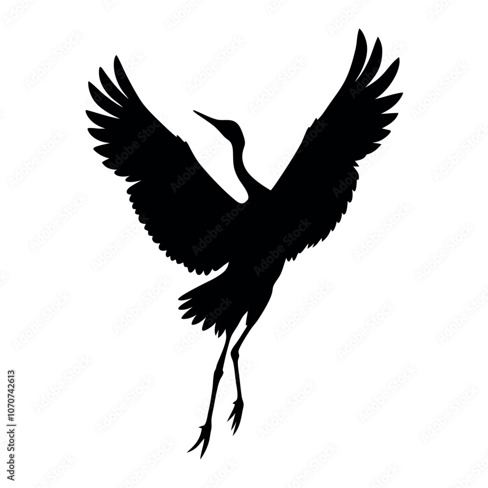 Fototapeta premium a black silhouette of a crane in flight isolated white background