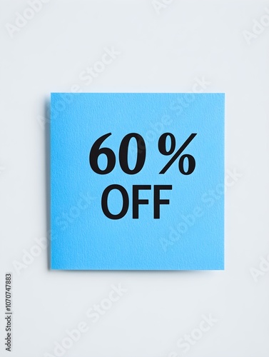 Black '60% OFF' Text on a Blue Square Paper Note. White Background 