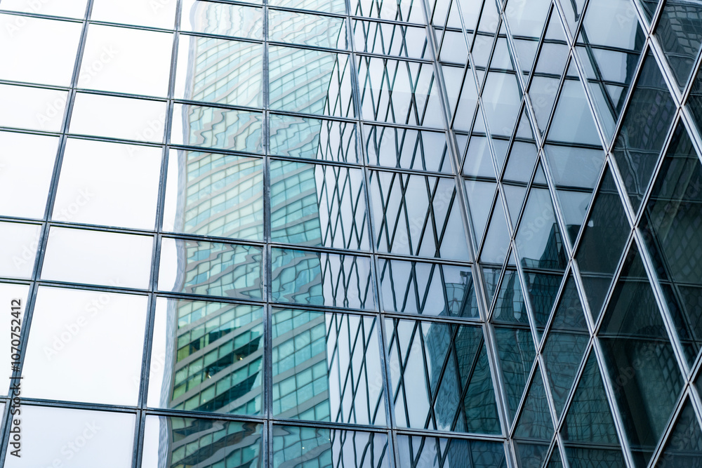 Fototapeta premium Background of detailed architecture. Modern business office. Business building. Building facade architecture. Architecture background. Glass building window. Architectural detail. Business office