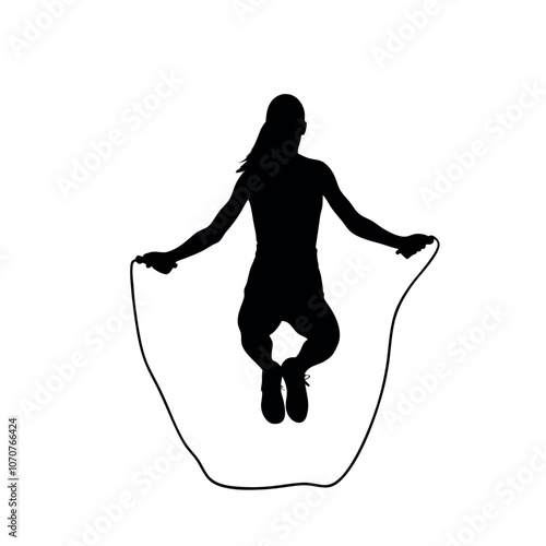 a woman skipping rope, with one foot off the ground and the other planted