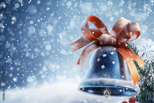 Snowy holiday bell with orange bow and pine.