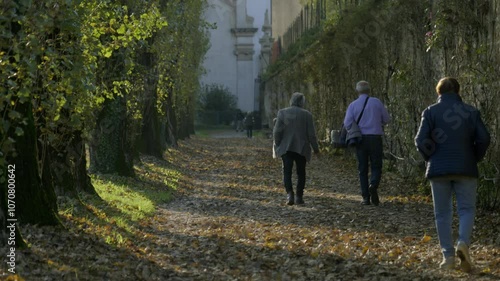 Elderly Couple Walking in Autumn Park - Brianza, Italy - 4K Slow Motion - Aging, Nature, Outdoors, Travel, Tourism