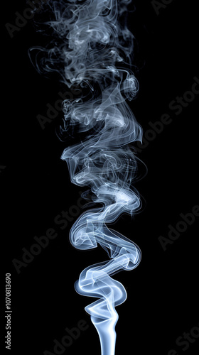 Wisps of blue smoke rising against black background