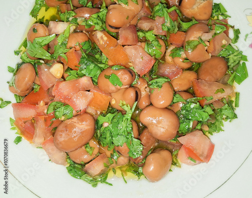 Ful medames or simply foul, is a dish of cooked fava beans served with vegetable oil, lemon It is a popular food in Arab countries.