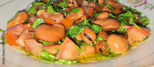 Ful medames or simply foul, is a dish of cooked fava beans served with vegetable oil, lemon It is a popular food in Arab countries.