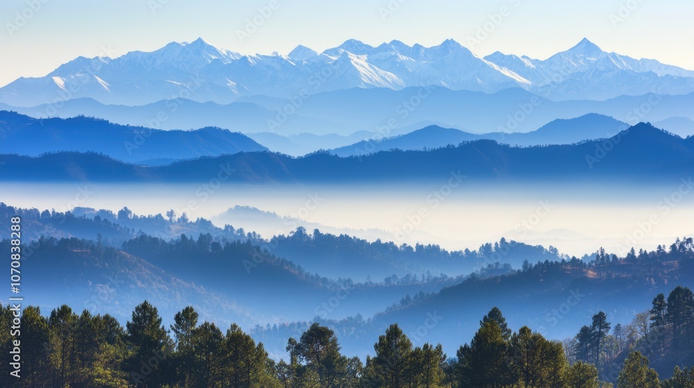 Naklejka premium Serene Snow-Capped Mountain Range at Dawn