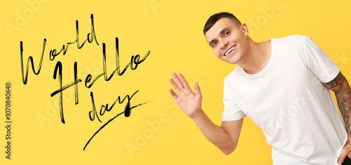 Handsome young man waving h...