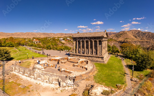 Aerial view of famous Garni pagan temple with Ionic-colonnaded. Historic Greek style building is located on gorge. Built in I century AD by Armenian king Trdat. Ancient Khosrov Reserve, Armenia Europe