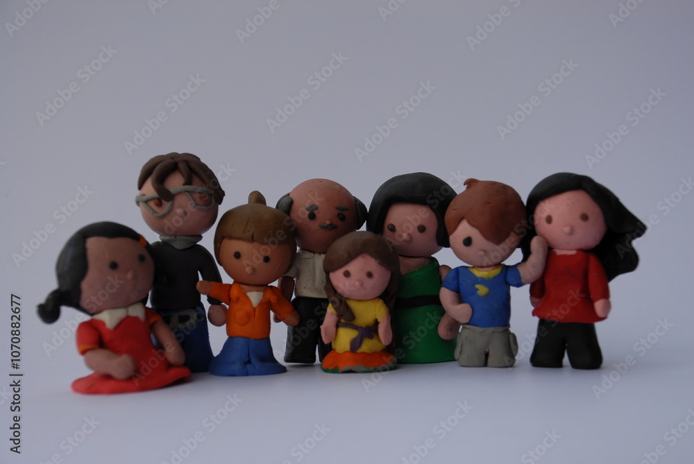 3D rendering in stylized clay of a group of people of diferent ages and genres. Familiy concept. Diversity concept. Inclusivity concept. 3D rendering in stylized clay of a group of people of diferent ages and genres. Familiy concept. Diversity concept. Inclusivity concept.