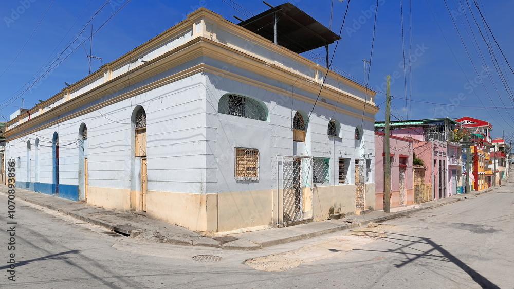 Pale-blue Colonial one-story house, bottom of Padre Pico Steps, Santa Lucia and Hospital Streets corner, buildings along the latter. Santiago-Cuba-544 Pale-blue Colonial one-story house, bottom of Padre Pico Steps, Santa Lucia and Hospital Streets corner, buildings along the latter. Santiago-Cuba-544