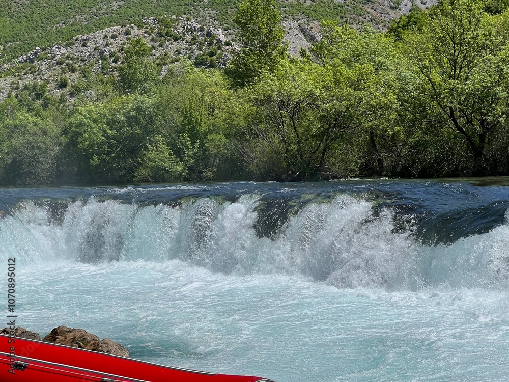 Fototapeta premium Ogar's waterfall or Ogarov buk waterfall on the Zrmanja river, Muskovci (Velebit Nature Park, Croatia) - Slap Ogarov buk ili Ogarov slap na rijeci Zrmanji, Muškovci (Park prirode Velebit, Hrvatska)