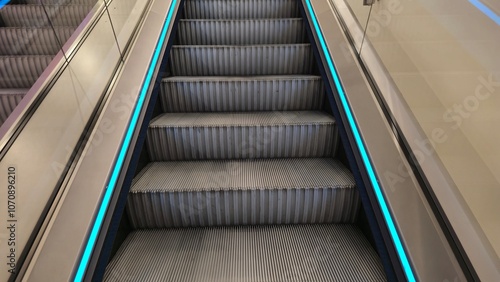 Escalator with Sleek Blue LED Accent Lighting photo