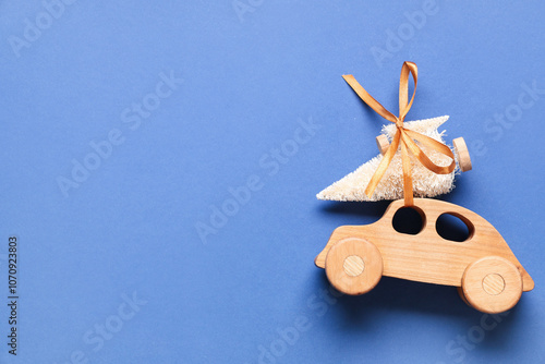 Toy wooden car with small C...